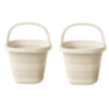 A pair of beige collapsible water buckets with handles for portable storage.