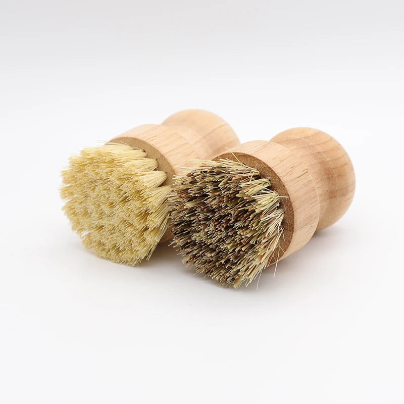 A set of two bamboo dish scrub brushes with sisal bristles, showing light yellow and dark brown fibers.