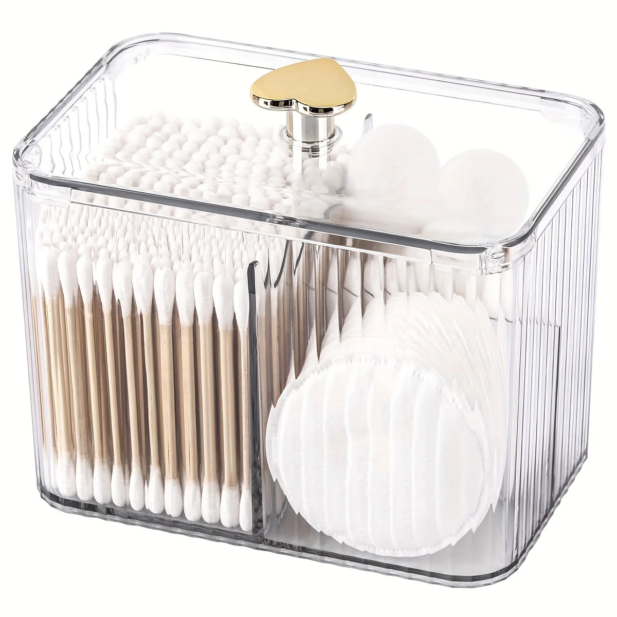 A clear plastic organizer jar with three sections holding makeup brushes and cotton balls.