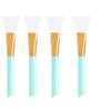 A set of six silicone facial mask brushes with white heads and wooden handles.