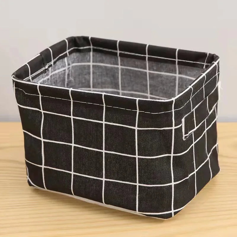 A black and white checkered storage basket made of cotton and hemp fabric.