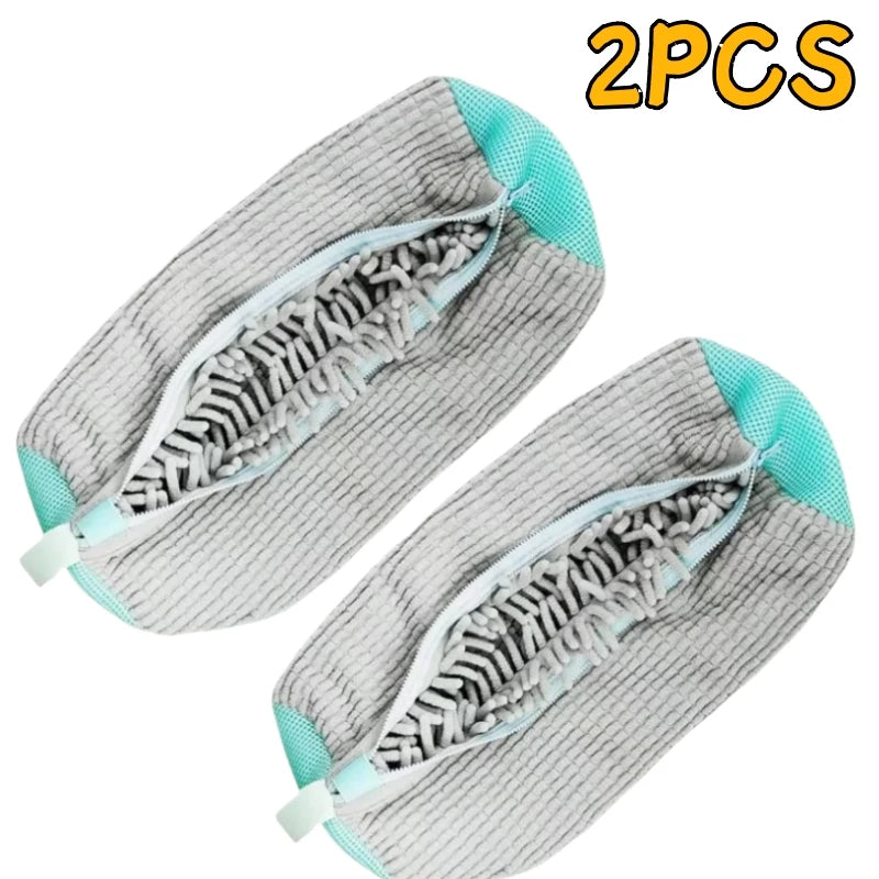 Two gray shoe cleaning brushes with storage bags shown diagonally.