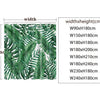 A pattern of green tropical leaves on a white background for a shower curtain.