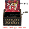 A wooden musical tone box featuring an anime character, labeled 144-B16, with the music title catch you catch me.