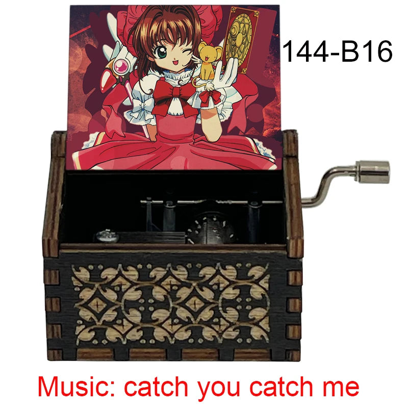 A wooden musical tone box featuring an anime character, labeled 144-B16, with the music title catch you catch me.