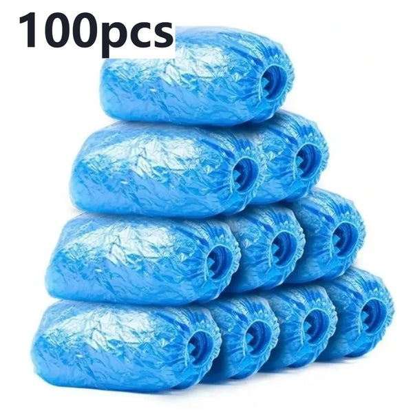 A stack of 100 reusable blue waterproof plastic shoe covers.