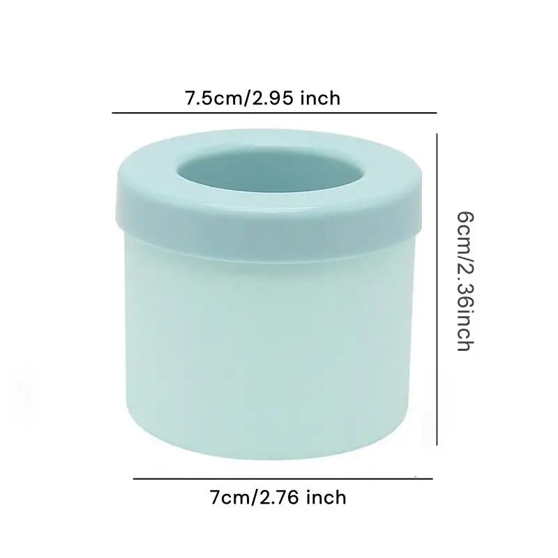 Light blue silicone ice cube mold with a lid, measuring 7.5cm in diameter and 6cm high.