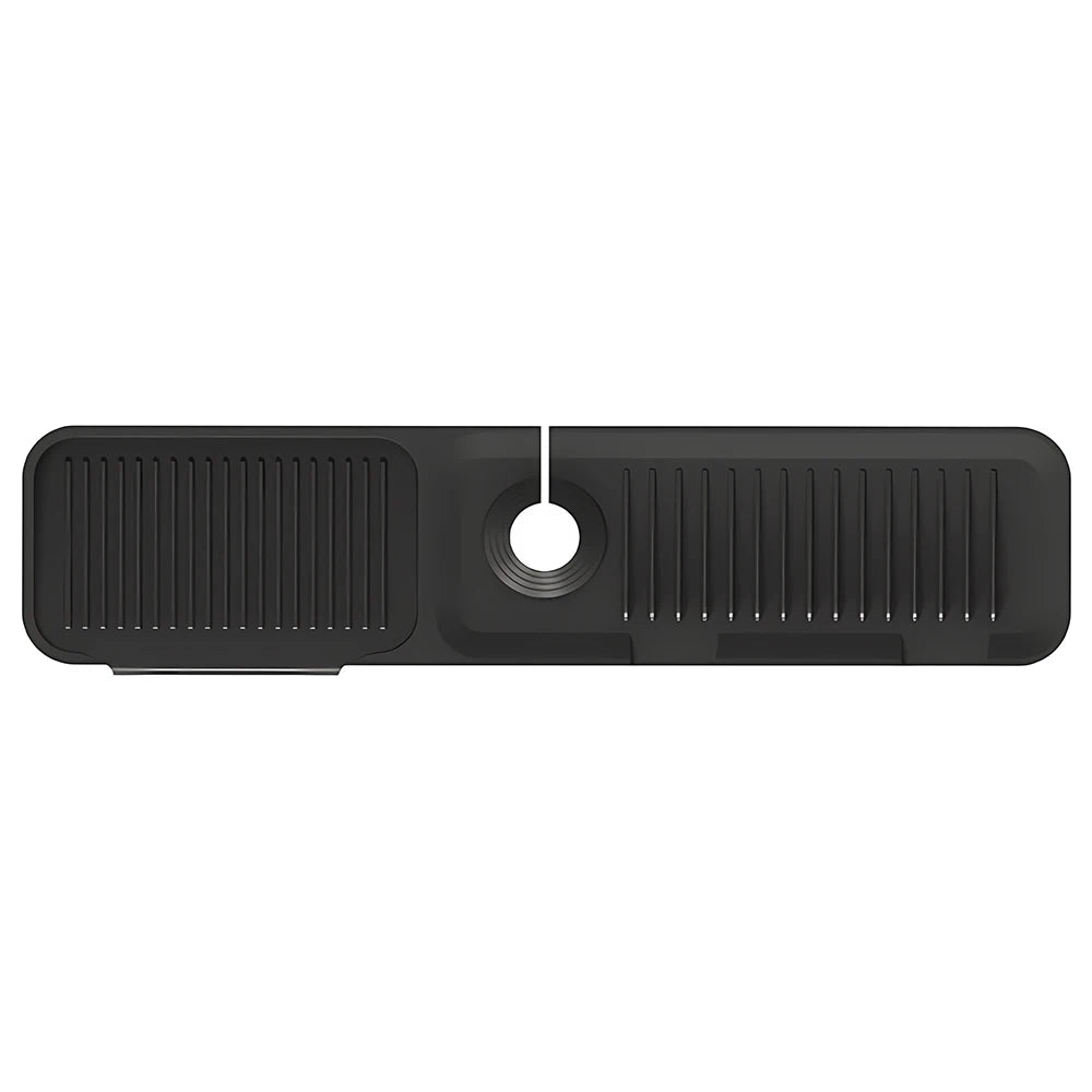 Black silicone sink splash guard mat with vertical ridges and a circular drain hole.