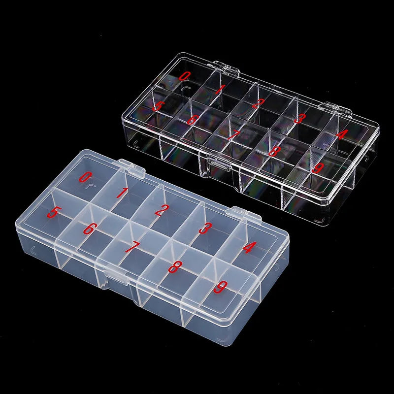 A clear plastic organizer box with numbered compartments for storing nail art supplies.