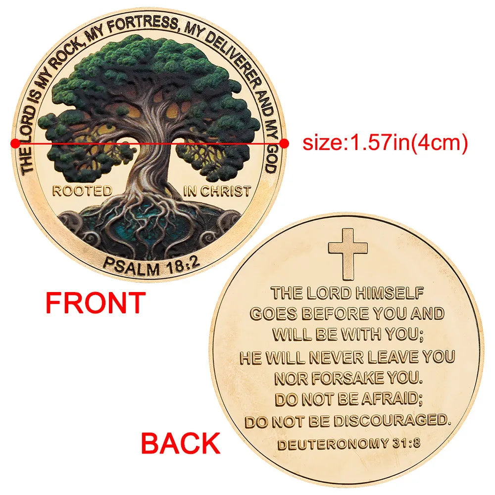 A round coin featuring a tree rooted in the earth with scripture text on the face and a verse on the back