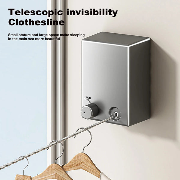 A silver telescoping clothesline device mounted on a wall, with a wooden hanger visible below.