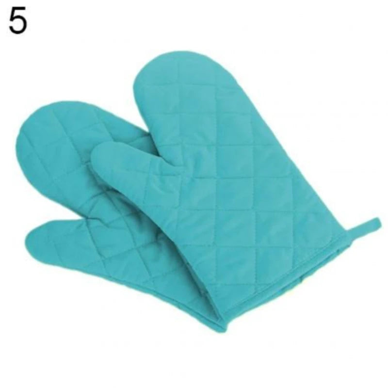 Light blue quilted heat resistant oven mitts shown from the side.