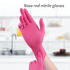 A hand wearing a pink rose red nitrile glove is shown in a close-up, suggesting disposable cleaning gloves.