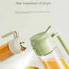A green oil pot is shown spraying oil onto food, demonstrating a new experience of oil pot use.