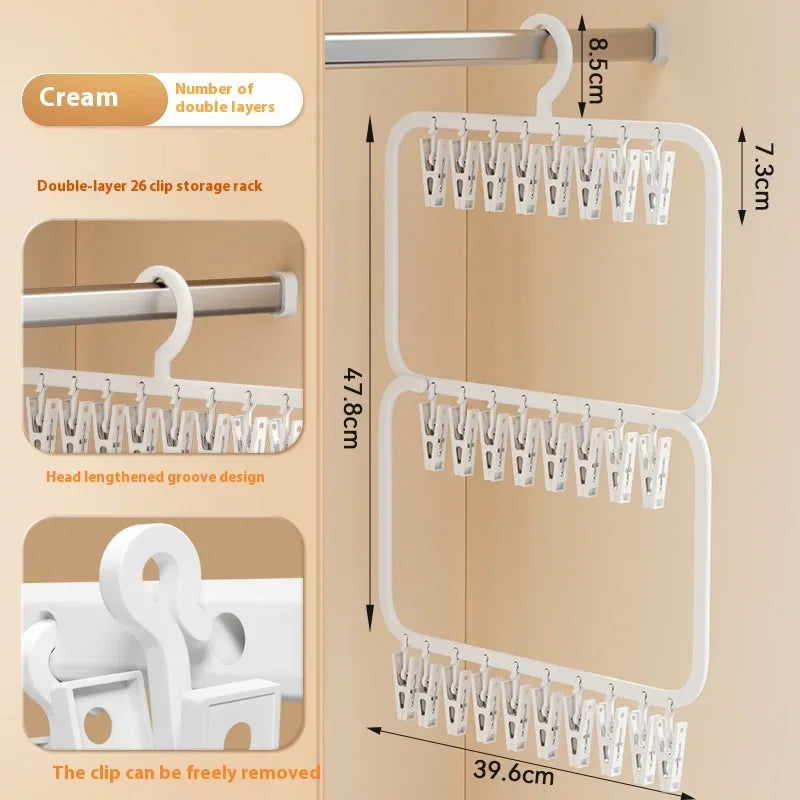 A beige wall-mounted multi-clip drying rack with double layers for storing and drying laundry or accessories.