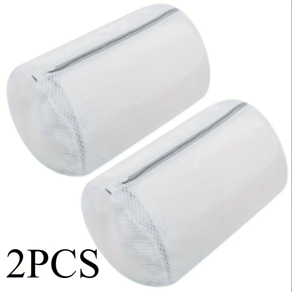 Two white mesh shoe cleaning bags shown from above