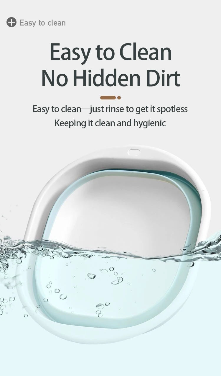 A white foldable plastic wash basin is shown being rinsed with water.