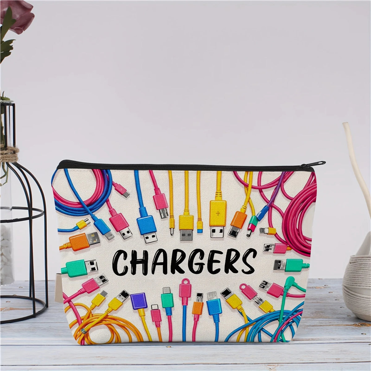A beige pouch filled with various colored charging cables, including USB-C and Lightning connectors.