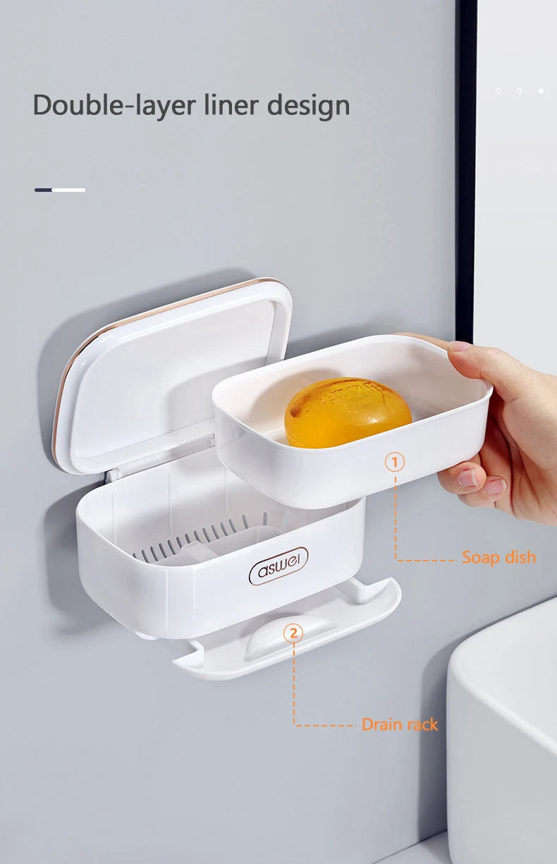A white double-layer liner design soap dish and drain rack mounted on a wall.