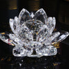 A clear crystal lotus flower centerpiece used as tabletop decor.