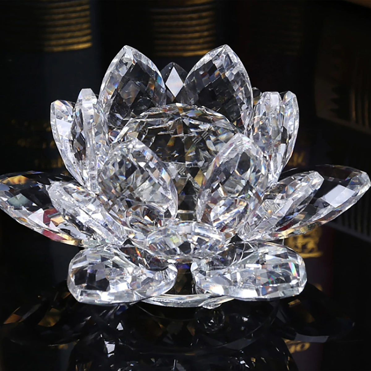 A clear crystal lotus flower centerpiece used as tabletop decor.