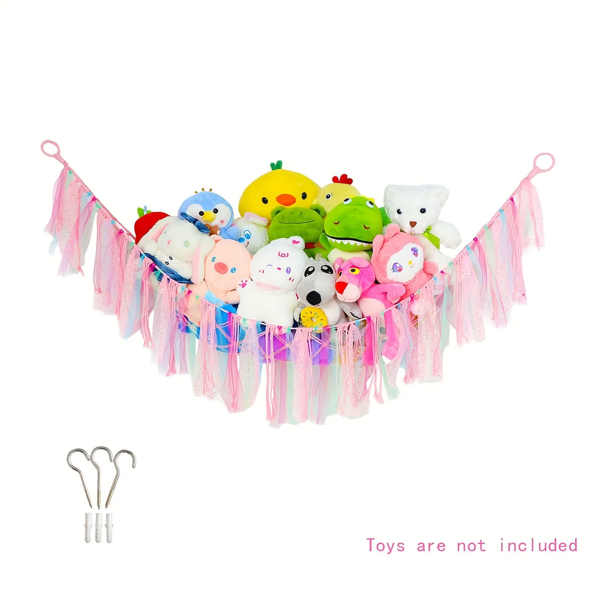 A colorful bohemian stuffed animal hammock featuring various plush toys hanging from pink and blue fabric strips.
