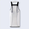 A white waterproof transparent kitchen apron with black straps hanging against a light gray background.