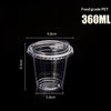 A clear food grade PET disposable coffee cup with a lid shown against a black background.