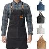 A dark gray plaid shirt worn by a person, with several versions of a black and tan kitchen apron displayed.