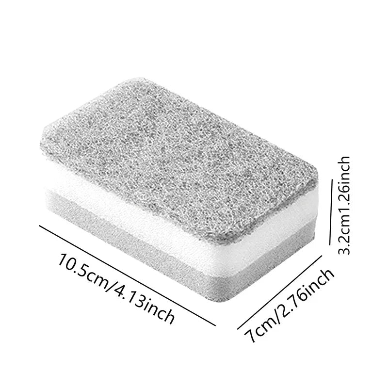 A rectangular double-sided cleaning sponge wipe showing its dimensions and texture.