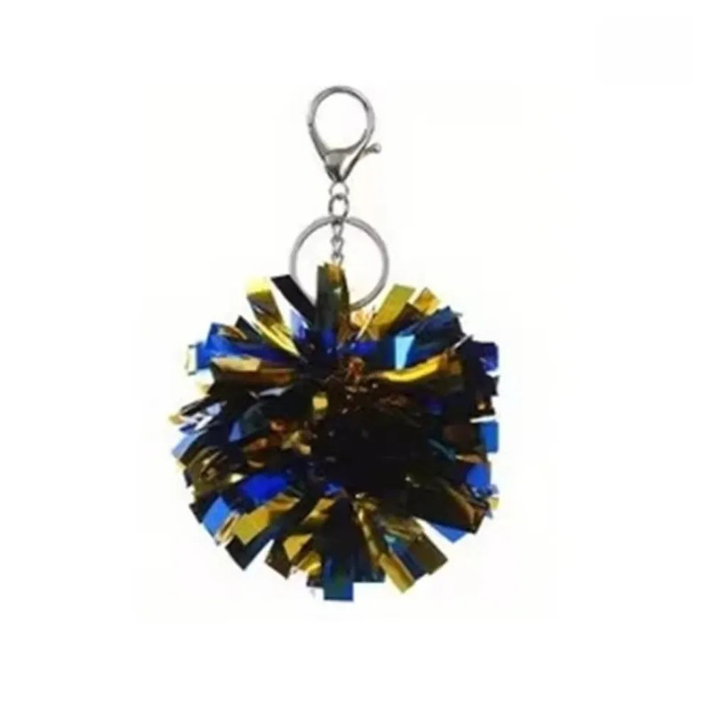 Glänzendes blau-goldenes Pom-Pom-Anhänger mit Metallhaken.
