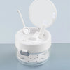 A clear plastic container with a lid and a removable mesh tray holds various dental tools like brushes and instruments.