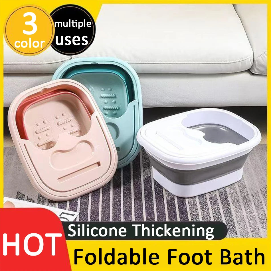 A set of three silicone foot bath tubs in pink, teal, and white are displayed on a surface.