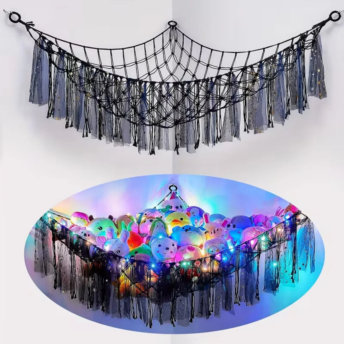 A black bohemian stuffed animal hammock featuring dangling fabric and colorful plush toys.