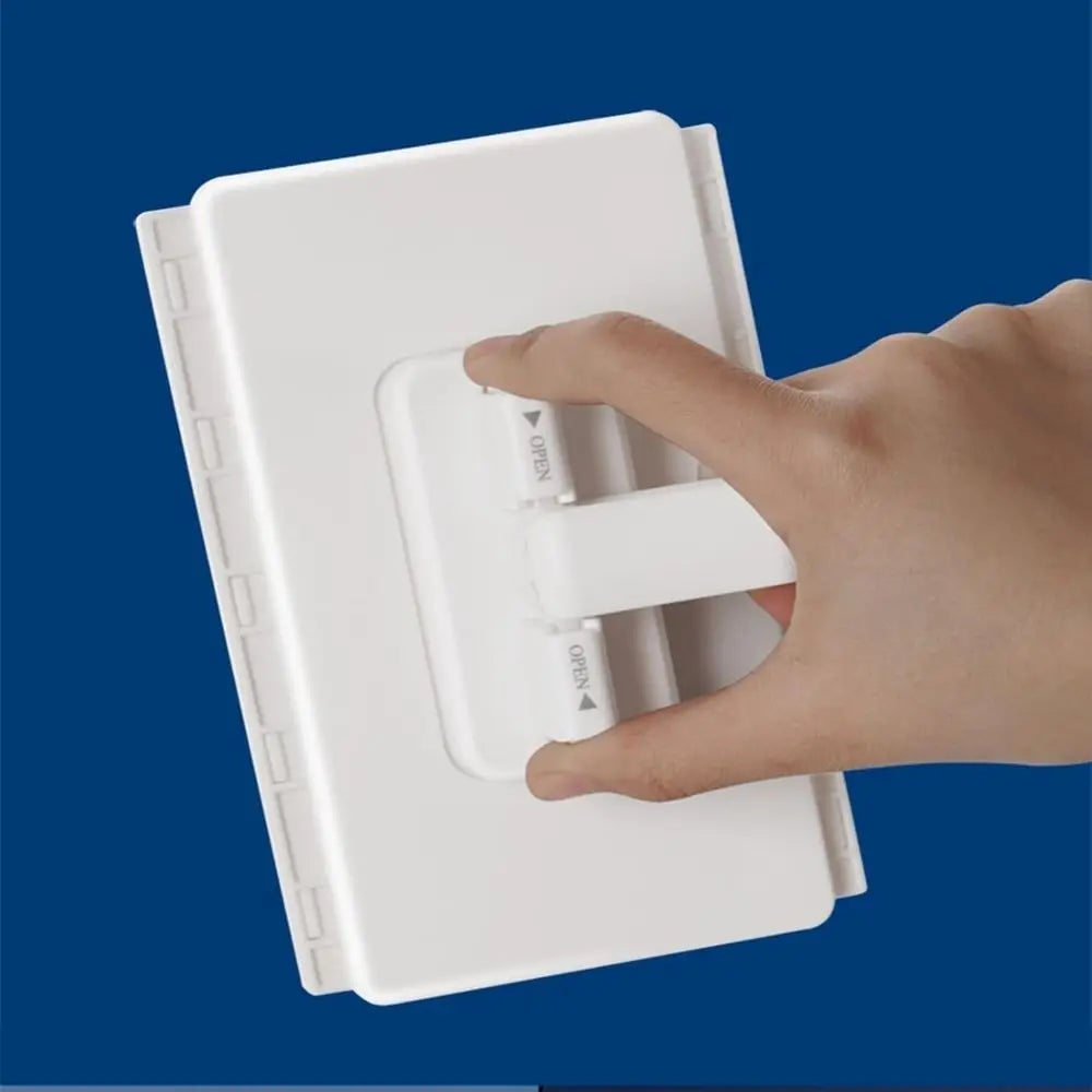 A hand is operating a white hands-free mop with rotating heads and reusable microfiber cloths.