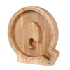 Piggy bank alphabet shaped like the letter Q for savings.