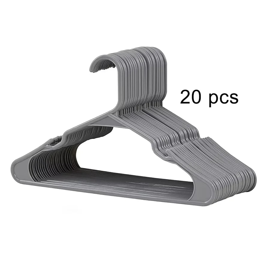 A set of 20 gray plastic clothes hangers with curved hooks.