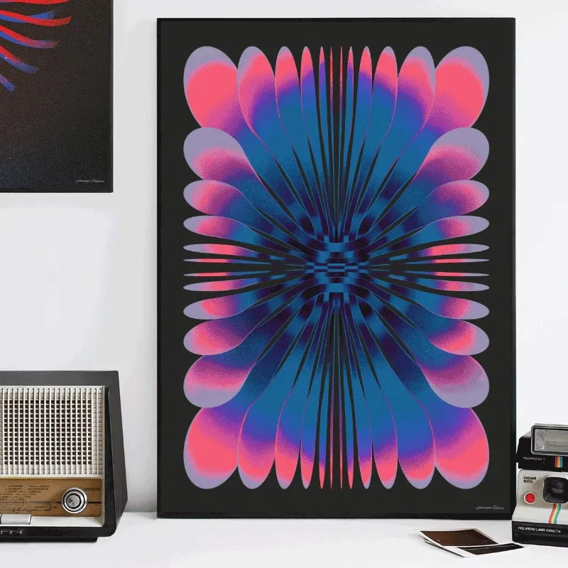 Abstract futurism canvas wall art print featuring a vibrant radial design of pink and blue petals on a black background
