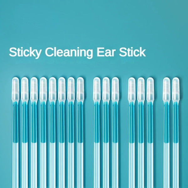 A row of clear silicone ear cleaning sticks displayed against a teal background.