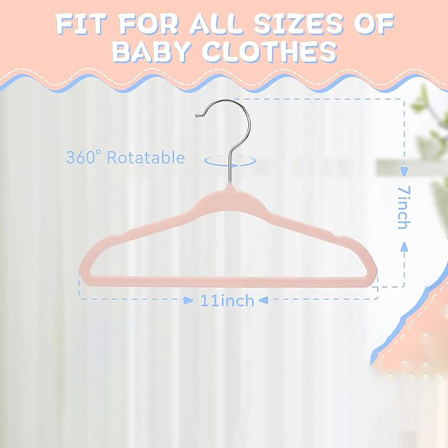 Pink non-slip velvet hanger for baby clothes, 360° rotatable and 11 inches long.