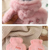 Two pink plush cartoon hot water bottles shaped like cute rabbits for warmth