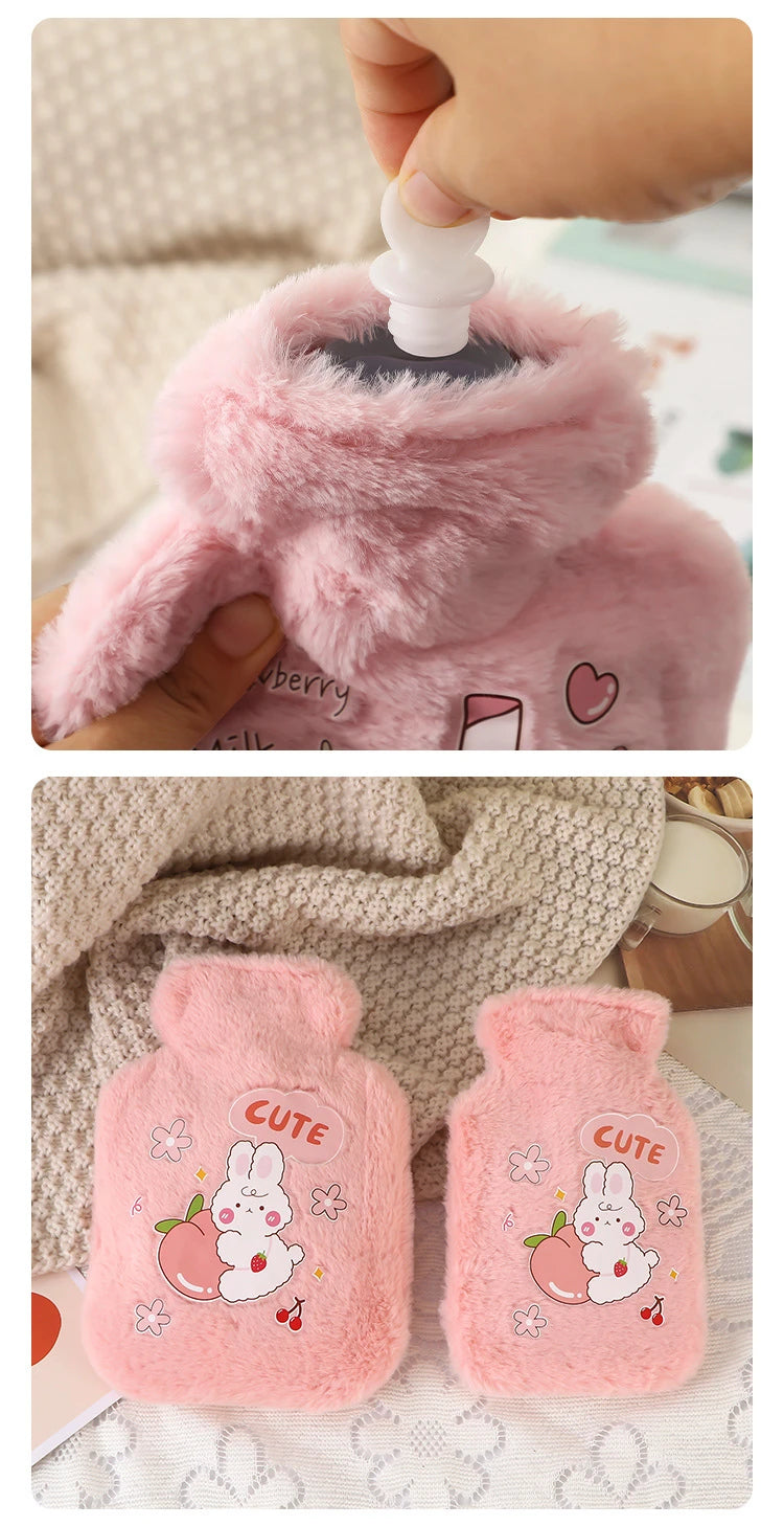 Two pink plush cartoon hot water bottles shaped like cute rabbits for warmth