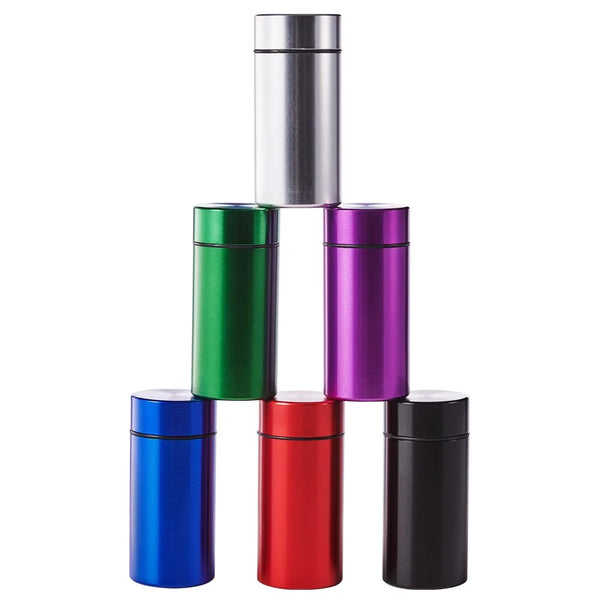 A set of five cylindrical airtight aluminum storage jars in silver, green, purple, blue, red, and black.