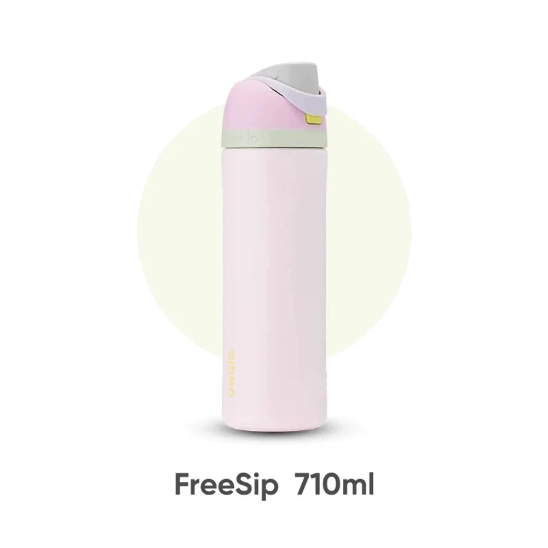 A pink FreeSip 710ml insulated water bottle with a light purple lid.