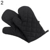 A pair of black quilted heat resistant oven mitts shown from the side.