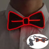 A glowing orange bowtie accessory worn on a shirt collar, with an inset showing the product.