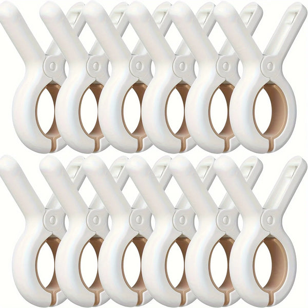 A multi-pack of white plastic drying clips with a sturdy design shown in a close-up view.
