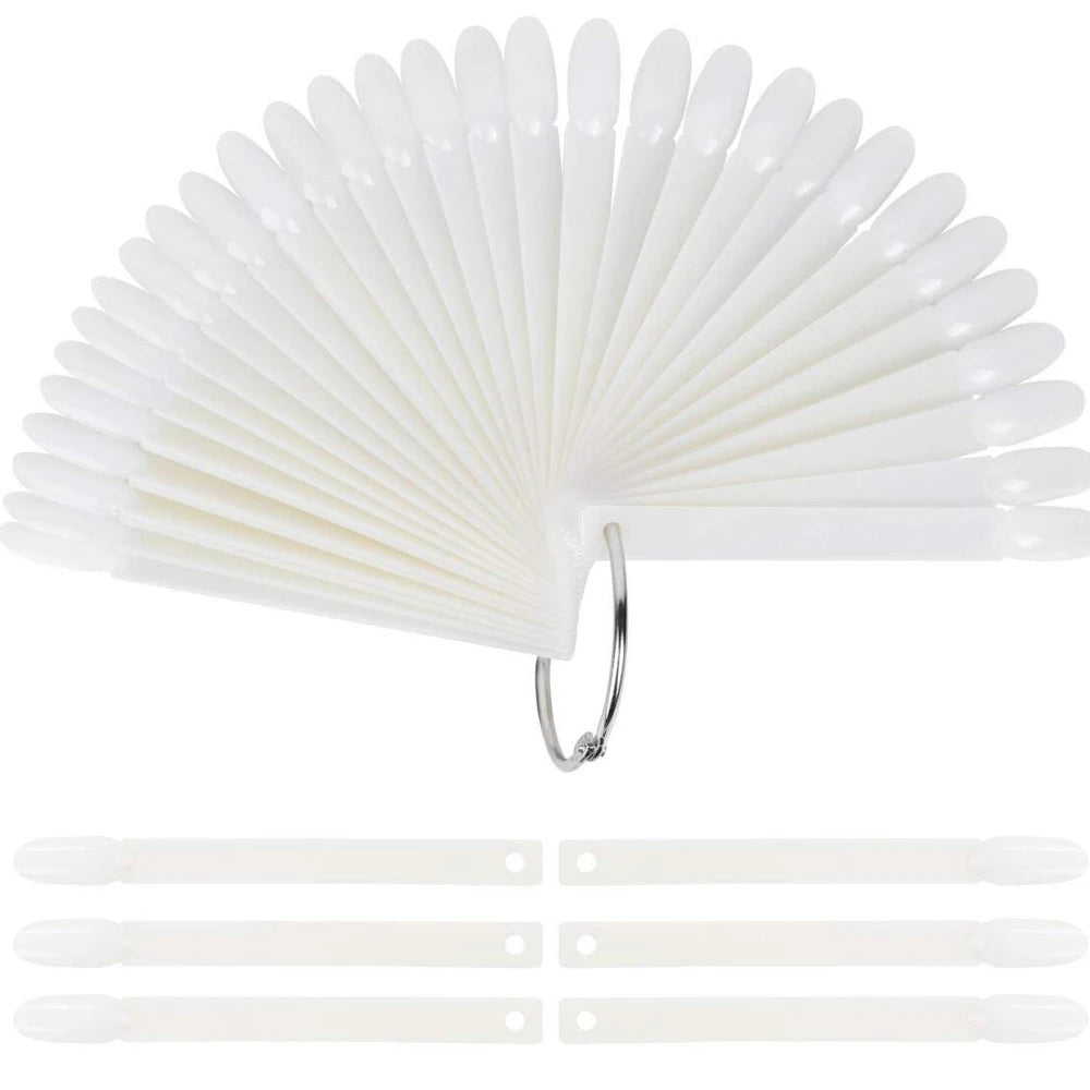 A fan-shaped set of white false nails for nail art practice