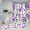 A shower curtain featuring a purple peony floral pattern and a matching floor mat.
