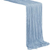 Light blue boho sheer fabric table runner draped and flowing